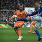 Painful end: Lyon's Brazilian defender Marcelo faces up to Strasbourg forward Ludovic Ajorque on Saturday