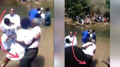 Lady attacks pastor during baptism, drags him into the river(video)