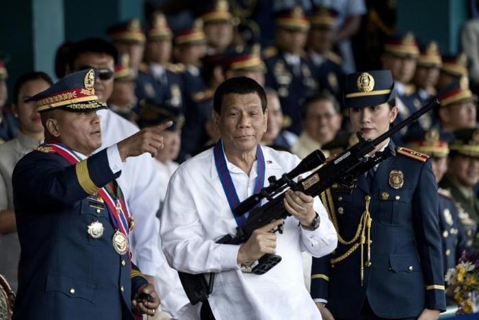 A victory for allies in Senate elections could see Philippines President Rodrigo Duterte (C) press major changes to the nation's constitution