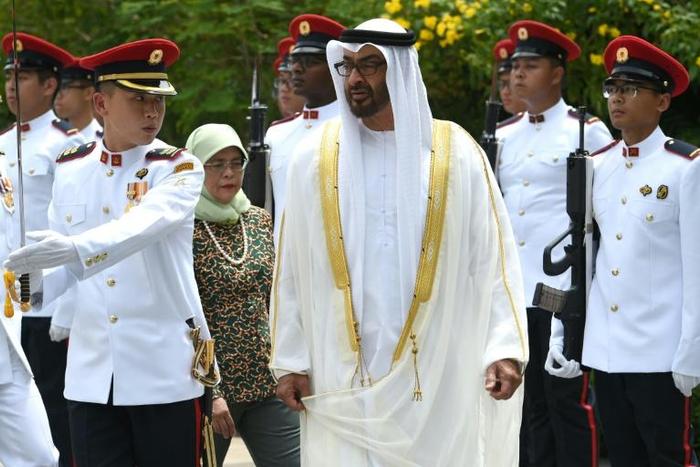 Abu Dhabi's Crown Prince Mohammed bin Zayed (C, pictured February 2019) discussed "regional developments" with Saudi Arabia's King Salman and his powerful son, Crown Prince Mohammed bin Salman