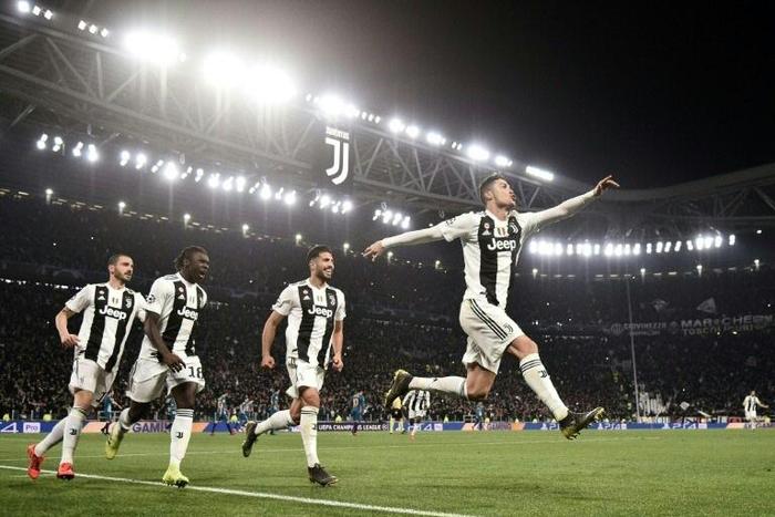 Cristiano Ronaldo (R) has scored a record 124 Champions League goals and won five titles