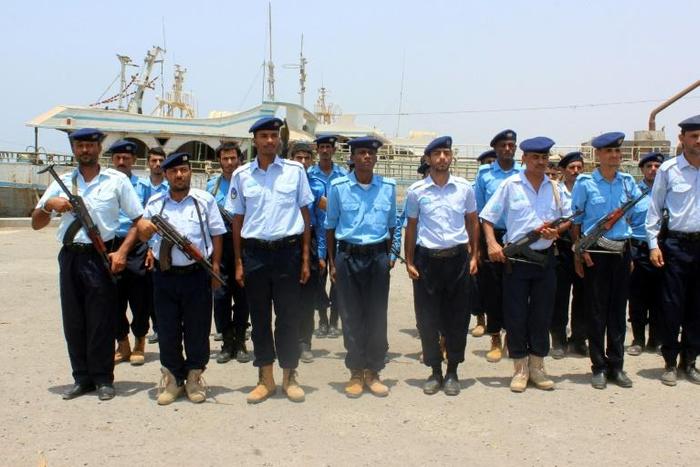 Members of the coastguard took part in the handover ceremony at Saleef port on Yemen's Red Sea coast