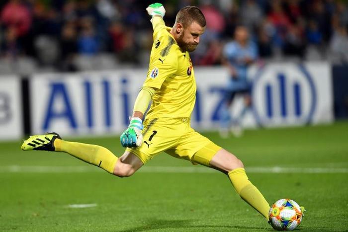 Sydney goalkeeper Andrew Redmayne (pictured during an AFC Champions League match) saved twice in the penalty shootout