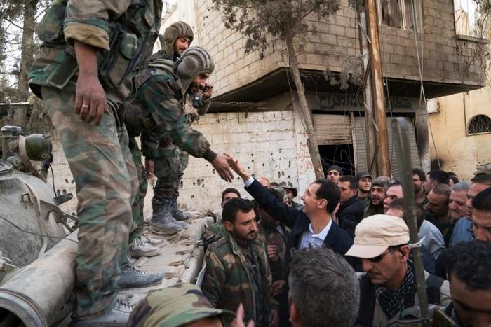 Turkey has backed rebels while Iran has supported Syrian President Bashar al-Assad (C) in his country's long war