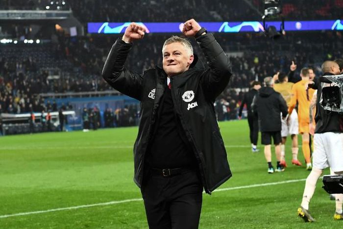 What a night: Manchester United coach Ole Gunnar Solskjaer celebrates victory over PSG on Wednesday