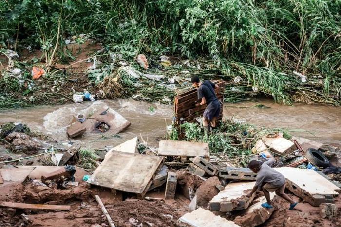 In addition to collapsed buildings and flooded roads, sewer lines were blocked and electricity pylons had toppled over
