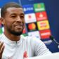 Midfielder Georginio Wijnaldum speaks to the press at Liverpool's training ground