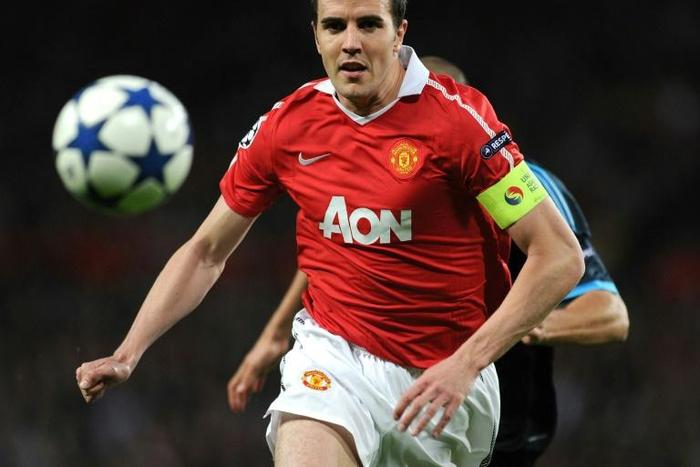 John O'Shea in action for Manchester United in 2011