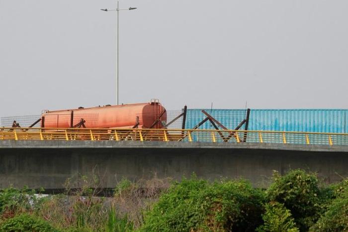 A tanker and shipping container are seen blocking the Tienditas Bridge on the border between Colombia and Venezuela