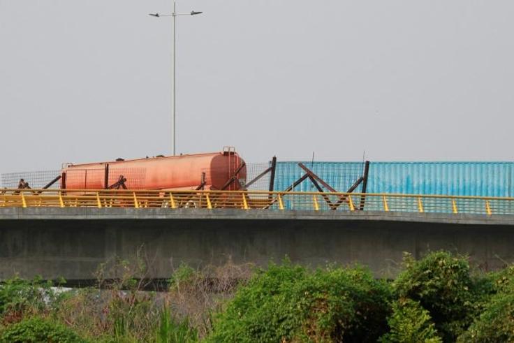 A tanker and shipping container are seen blocking the Tienditas Bridge on the border between Colombia and Venezuela