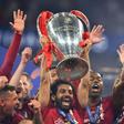 Mohamed Salah lifts the Champions League trophy after Liverpool were crowned kings of Europe for a sixth time