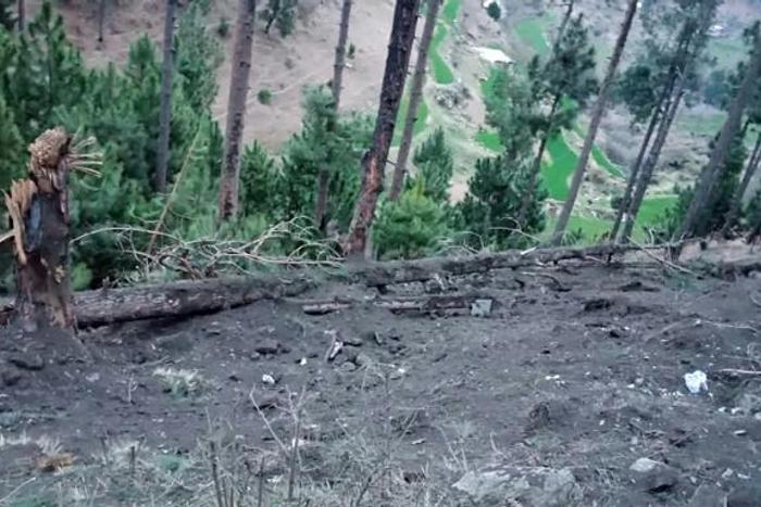 Photograph released by Pakistan's Inter Services Public Relations shows damage in hilly terrain in the Balakot area where Pakistan said Indian planes briefly violated its airspace