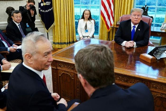 US President Donald Trump watches as Chinese Vice Premier Liu He (L) speaks with US Trade Representative Robert Lighthizer during a February 22, 2019 meeting in the White House on trade