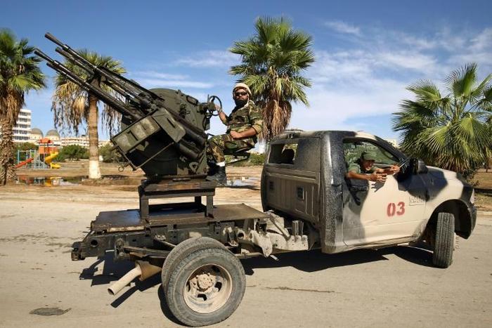 Soldiers loyal to Libyan strongman Khalifa Haftar on guard duty during the 2018 edition of the Benghazi International Forum and Exhibition of Oil & Gas, in October 2018