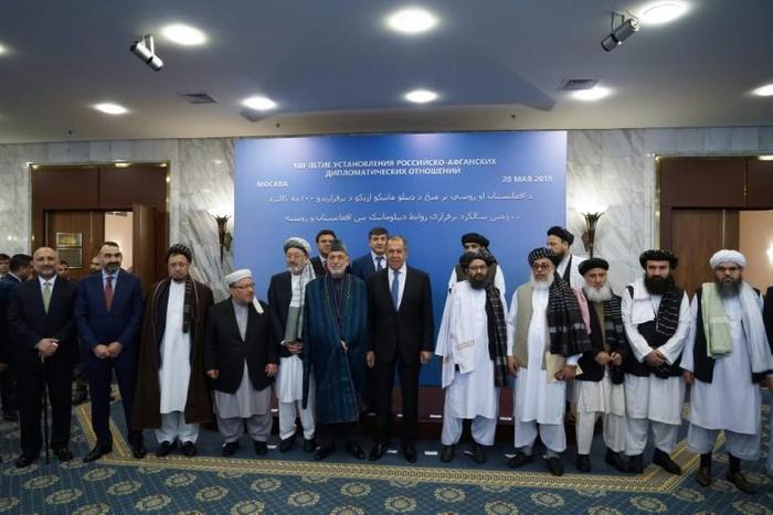 Former Afghan President Hamid Karzai with Taliban and Russian officials in Moscow