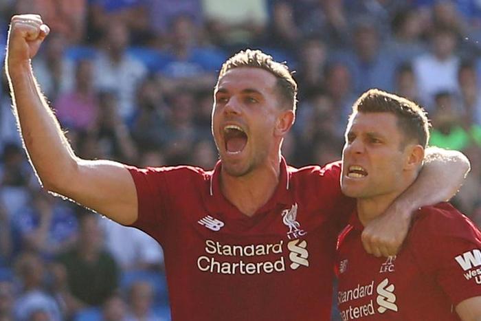 James Milner celebrates scoring Liverpool's second goal against Cardiff