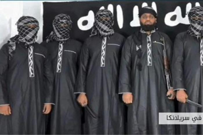 The Islamic State group published a picture of eight men it said were behind the attacks in Sri Lanka