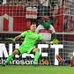 Marvin Friedrich (2L) deflected in a shot from Stuttgart's Mario Gomez (R) before equalising for Union Berlin