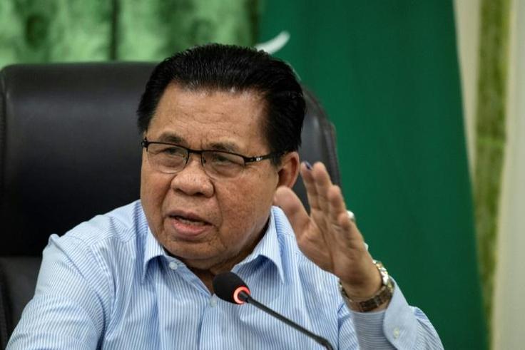 Moro Islamic Liberation Front chairman Murad Ebrahim gestures during a press conference on the southern Philippine island of Mindanao last month. On Friday he was sworn in as interim chief minister of the Bangsamoro region