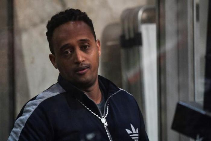 The man believed to be Eritrean Medhanie Yehdego Mered, on trial as the alleged head of one of the largest migrant trafficking networks, says his case is one of mistaken identity and he is really a carpenter called Medhanie Tesfamariam Behre