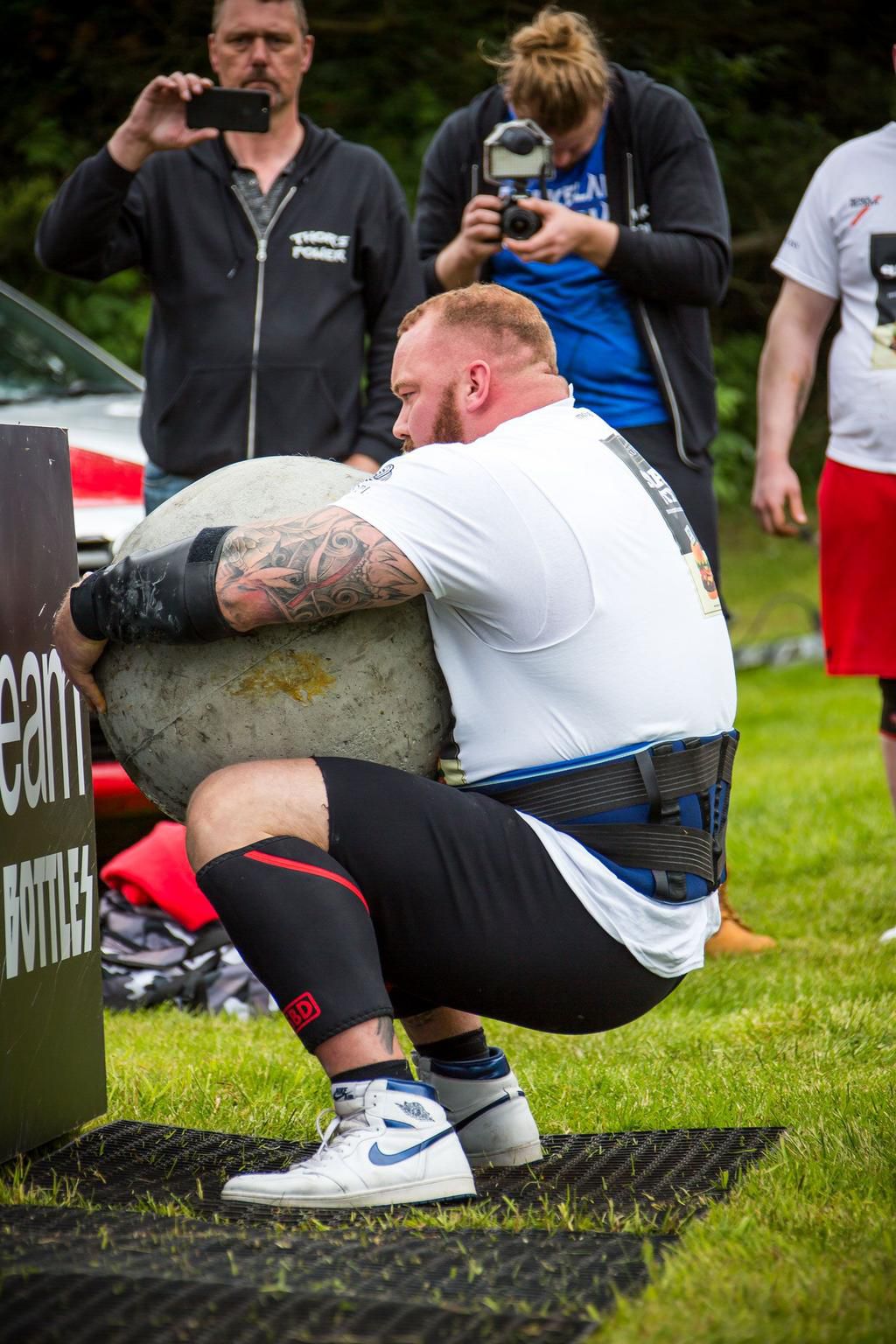 The Mountain lifts an Atlas ball in training