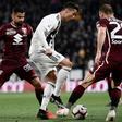 Juventus forward Cristiano Ronaldo (C) scored his 21st league goal this season.