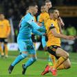 Newcastle's Miguel Almiron challenges Wolves' Conor Coady