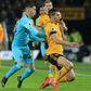 Newcastle's Miguel Almiron challenges Wolves' Conor Coady