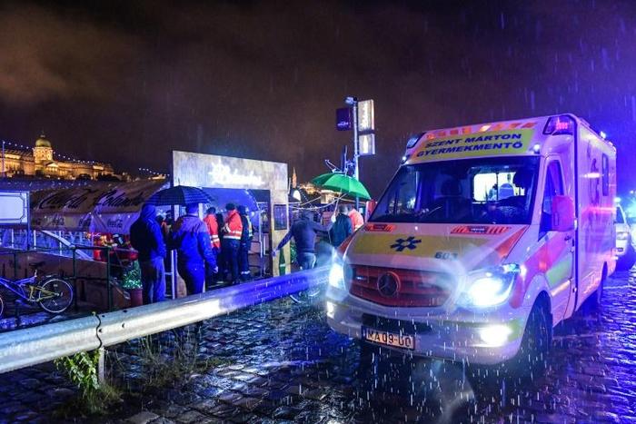 Rescue workers swarmed to the banks of the Danube in Budapest after a river cruise boat capsized