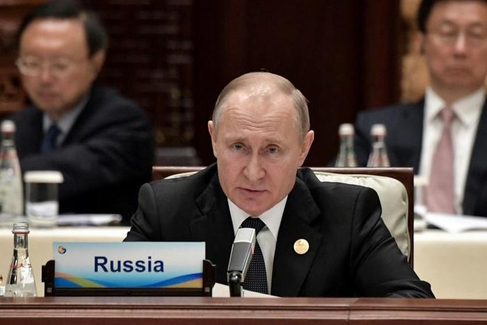 Russia's President Vladimir Putin speaks during a roundtable summit session on the final day of the Belt and Road Forum in Beijing on April 27, 2019
