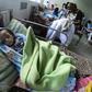 An undernourished baby in a hospital bed in Maracay, Aragua state, Venezuela on February 7, 2019