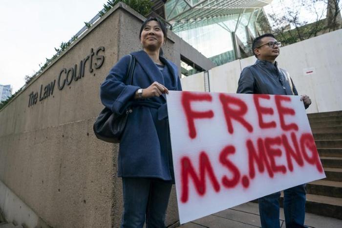 Supporters protest outside the bail hearing for Huawei Technologies CFO Meng Wanzhou, who was arrested on December 1 2018 as she changed planes in Vancouver