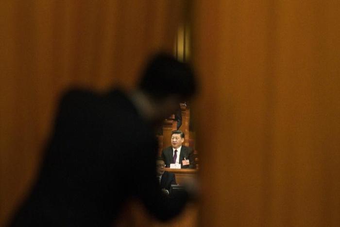 One year after the legislature abolished presidential term limits and etched Xi Jinping's name on the constitution, his "new era" vision of a resurgent China at the centre of world affairs has hit unforeseen road bumps
