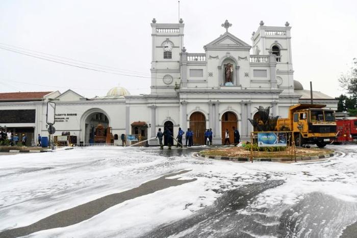 Sri Lankan Navy soldiers used soap and water jets to clean away the reminders of the massacre at St. Anthony's Shrine in Colombo