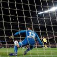 Lionel Messi scored twice, the first from the spot, to save a point for Barcelona against Valencia