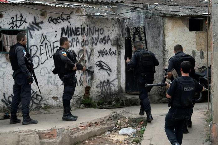 Brazilian military police (similar to the ones pictured June 2018) said they "shot 12 criminals" during an operation to stop a firefight between two drug-trafficking gangs in the Fallet, Fogueteiro and Coroa favelas