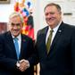 Chilean President Sebastian Pinera shakes hands with US Secretary of State Mike Pompeo (R) at La Moneda Presidential palace in Santiago, April 12, 2019