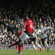 Easy does it: Paul Pogba scores his second goal from the penalty spot in Manchester United's 3-0 win away to Fulham