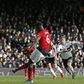 Easy does it: Paul Pogba scores his second goal from the penalty spot in Manchester United's 3-0 win away to Fulham