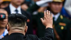 North Korea's leader Kim Jong Un (L) leaving Vietnam after a summit with US President Donald Trump ended in failure