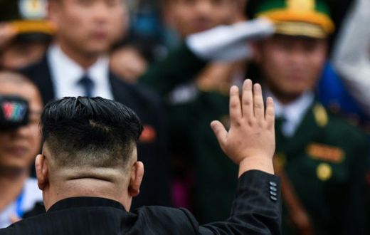 North Korea's leader Kim Jong Un (L) leaving Vietnam after a summit with US President Donald Trump ended in failure