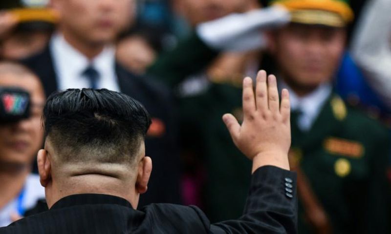 North Korea's leader Kim Jong Un (L) leaving Vietnam after a summit with US President Donald Trump ended in failure