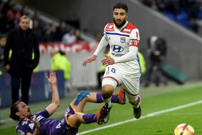 Lyon captain Nabil Fekir in action against Toulouse last weekend - his side can still outdo Paris Saint-Germain and reach the Champions League quarter-finals