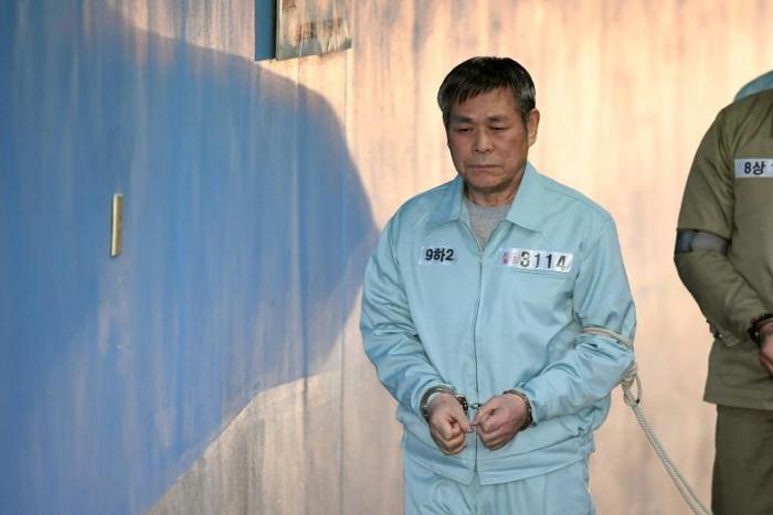 South Korean pastor Lee Jaerock arrives at the Seoul Central District Court to attend his original trial in Seoul in 2018