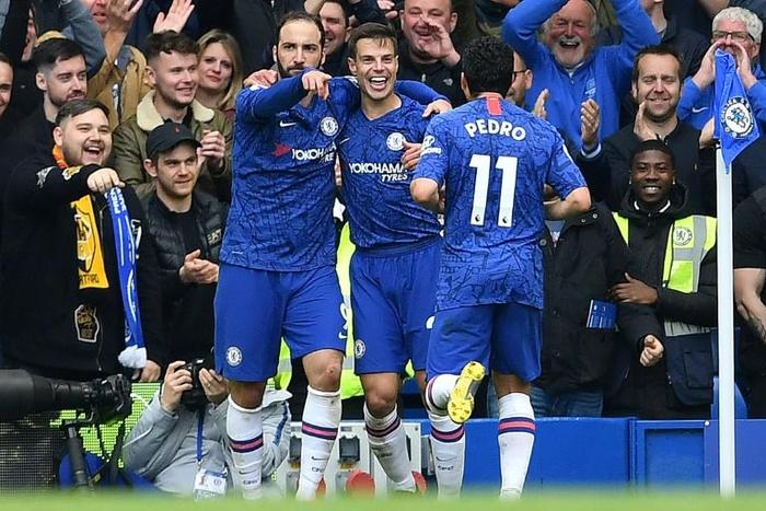 Gonzalo Higuain (left) celebrates his goal for Chelsea in their 3-0 win against Watford