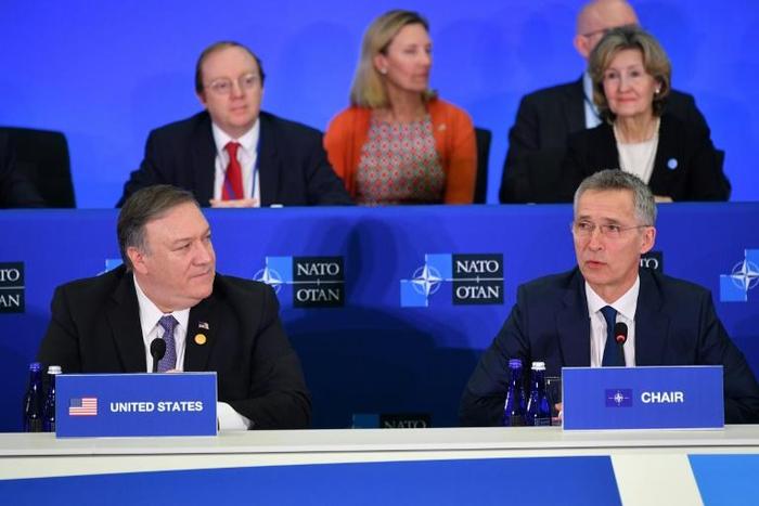 NATO Secretary General Jens Stoltenberg (right) and US Secretary of State Mike Pompeo open a NATO session in Washington on its 70th anniversary on April 4, 2019