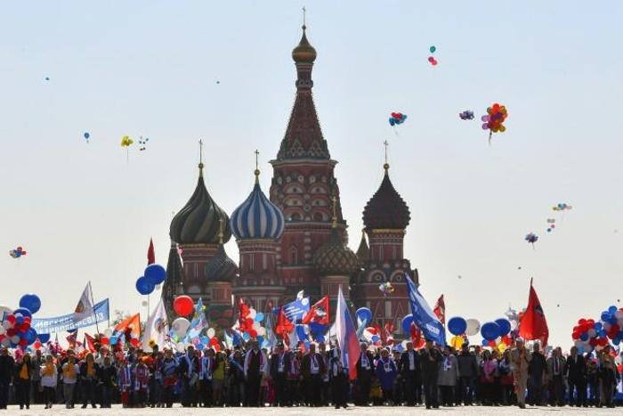 Thousands of Communists demonstrated in Moscow and across Russia on May Day, waving red flags, in celebrations harking back to the Soviet-era