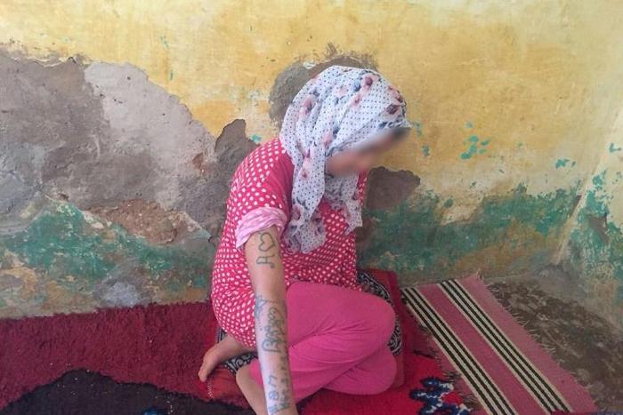 Moroccan teenager Khadija Okkarou showed tattoos that she said were carved into her body by her attackers in a video posted online