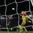 Sokratis scored Arsenal's decisive third goal to see them past BATE Borisov at the Emirates Stadium and into the Europa League last 16