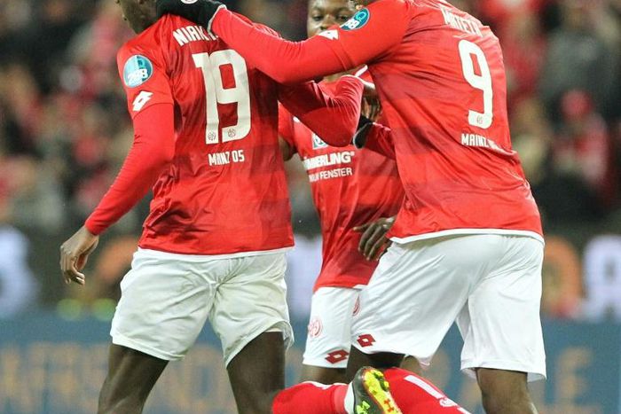 Moussa Niakhate (L) and Jean-Philippe Mateta (R) both scored as Mainz came from behind to draw with Leipzig on Friday